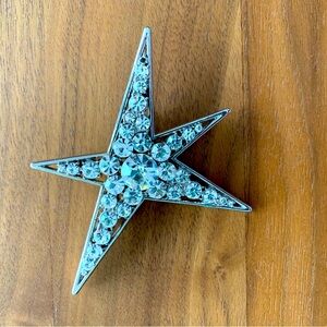 EUC Sparkling Star Brooch with Crystals set in silver coloured metal. Pin back.